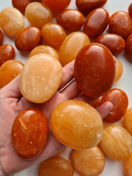 Orange Calcite Palm Stones